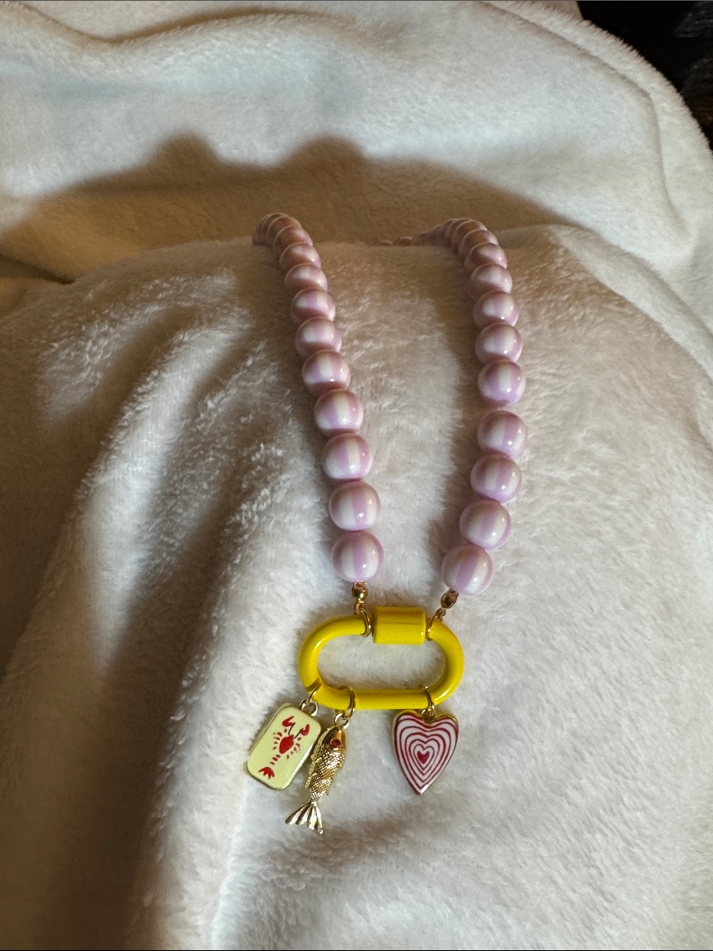 Pink Beaded Necklace with Yellow Clasp and Heart & Fish Charms